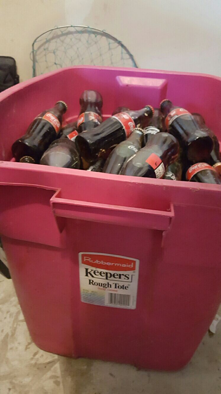 Collection of coke bottles