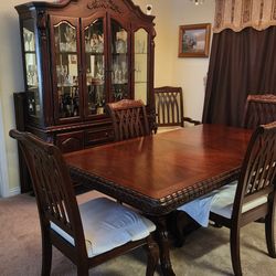 China cabinet and table with 6 chairs