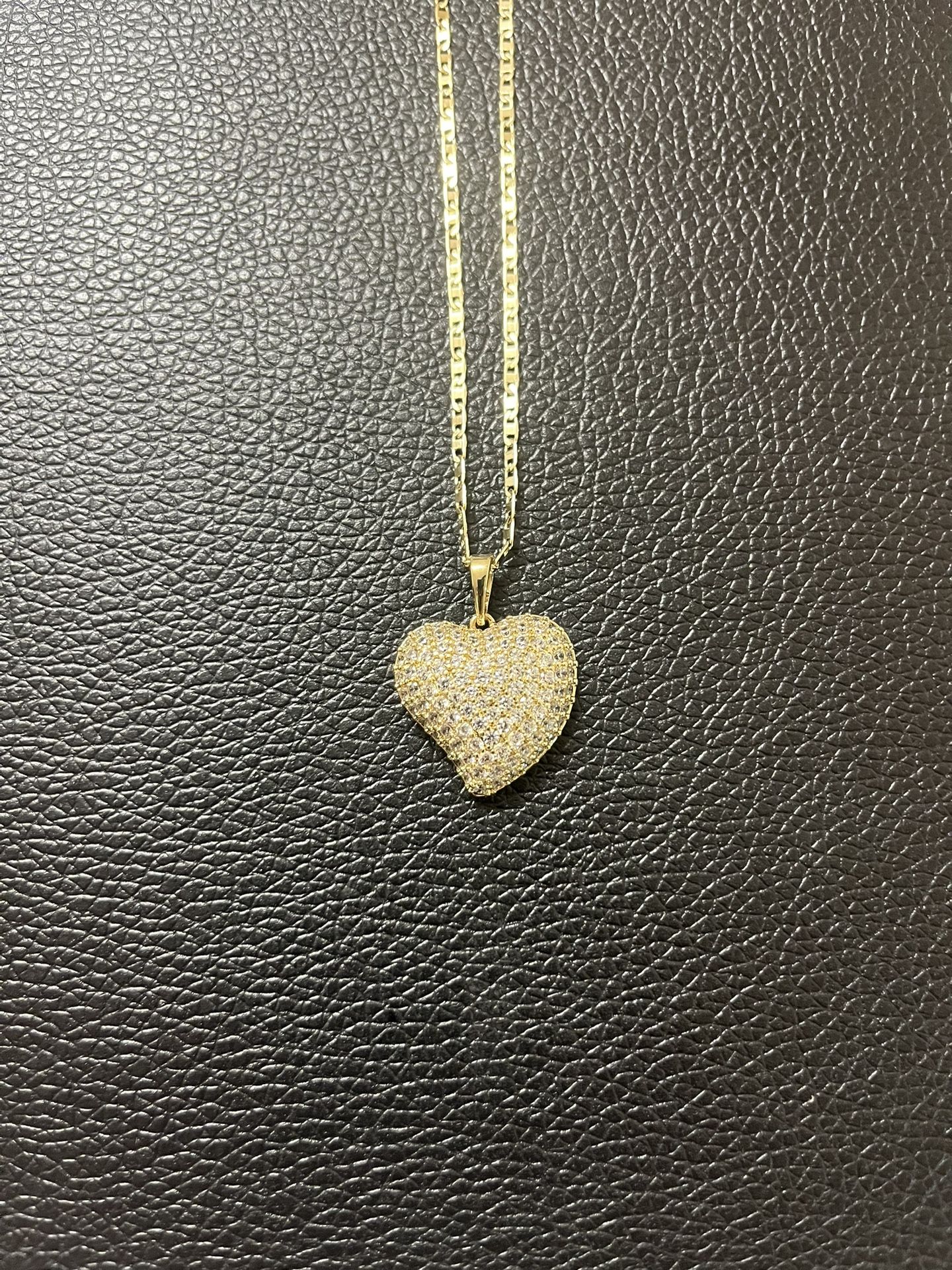 14 k gold plated heart pendant with chain.