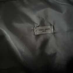 It’s Very Good Duffle Bag Made By GORGIO Armani. The Color Is Teal.