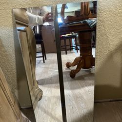 MIRRORS 7 1/2w x 31 1/2"tall; THERE ARE 2 OF THESE.  $15 EACH