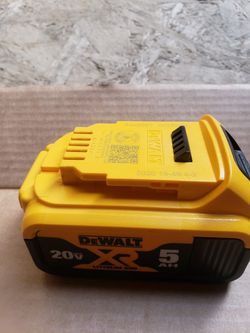 LIKE NEW DEWALT BATTERY 20V XR 5AH HAS A SMALL CRACK BUT OTHERWISE WORKS PERFECTLY