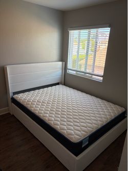 Comfy Queen mattress + storage bed frame