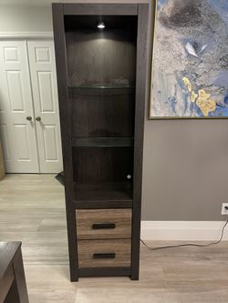 Two Ashley Furniture Hatch Tall cabinet