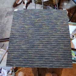 2 ft by 2 ft with a rubber backing carpet pieces