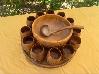 Hand carved punch bowl set