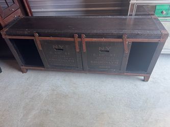 Dark brown tv stand with sliding doors
