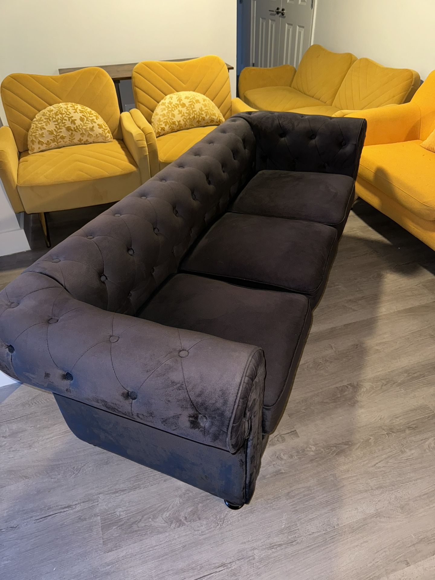 Black velvet sofa