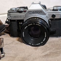 Vintage Camera Cannon AE1 55mm In Excellent Condition $175