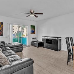 Leather Sectional And Ottoman 
