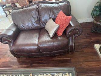 2 seat brown sofa