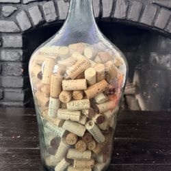 Large Glass Thick Filled With Wine Corks