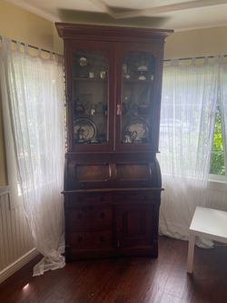 Antique roll up desk w/display case.
