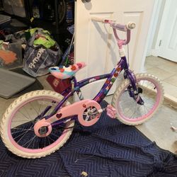 Pink children’s Huffy bicycle 