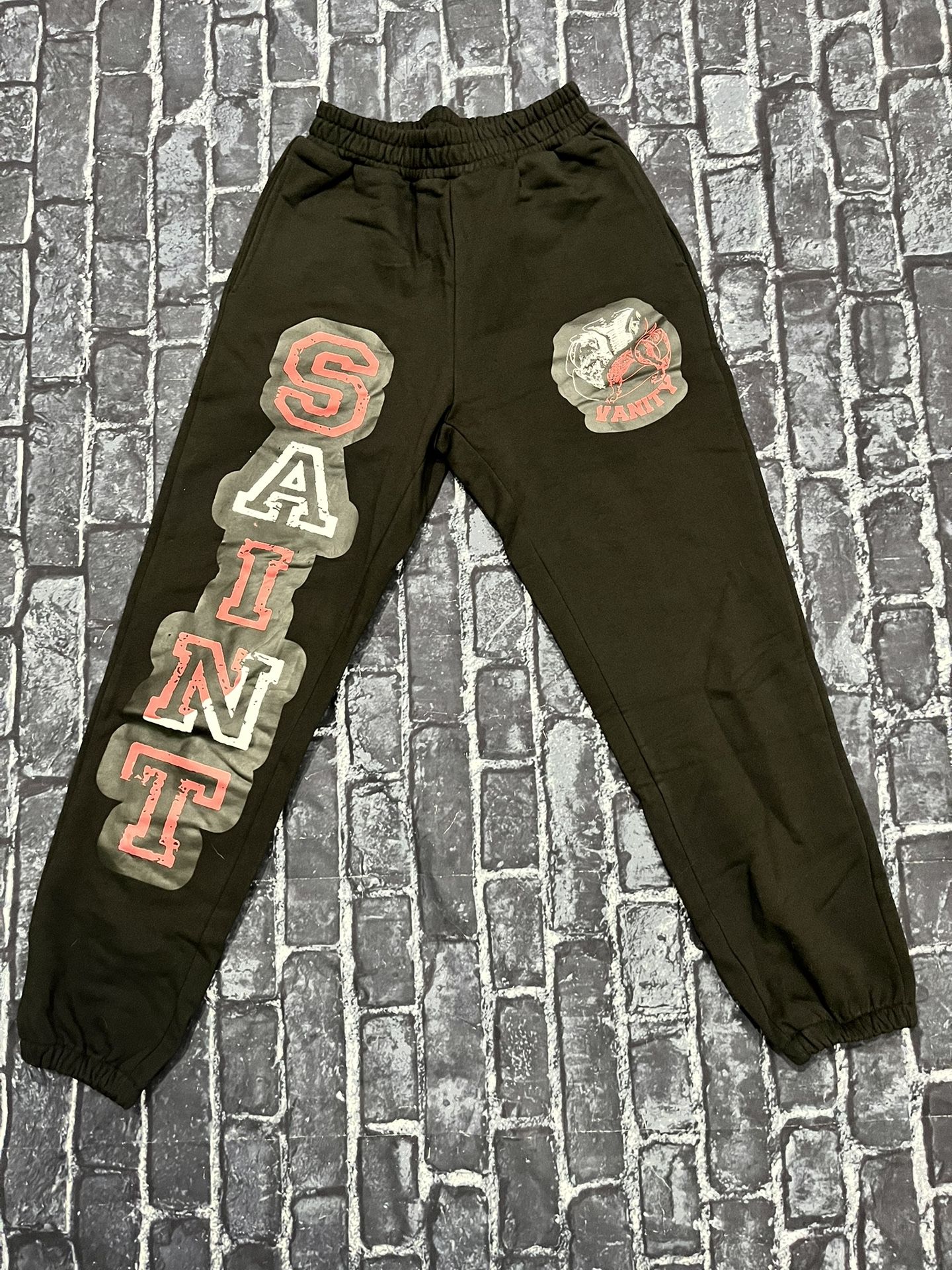 saint vanity red and black sweatpants 