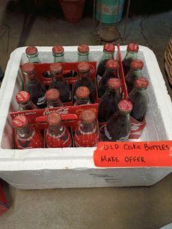 Vintage Coca-Cola Glass Bottle Collection