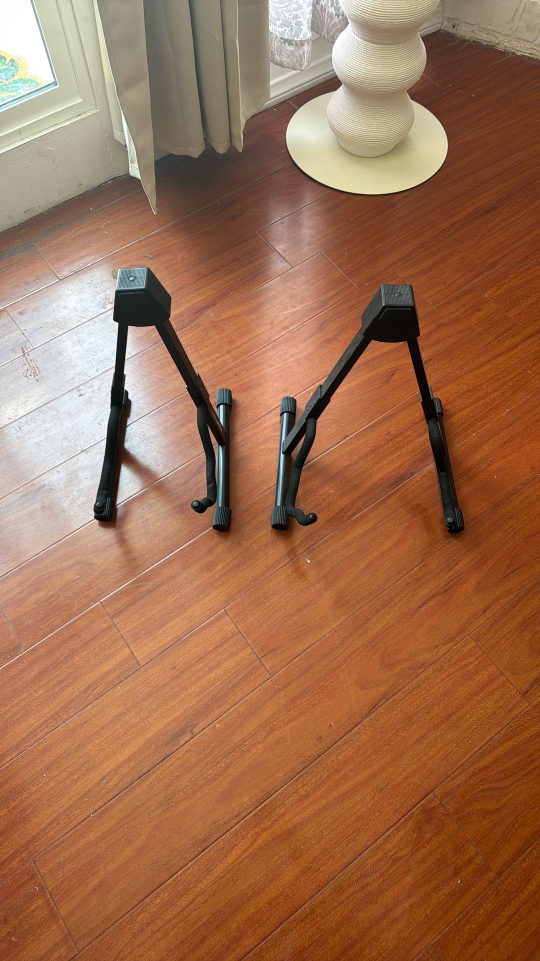 Two guitar stands fully adjustable like new condition