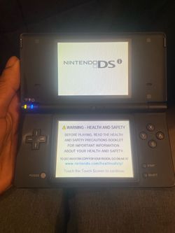 Nintendo DSi Handheld Gaming Console+ charger