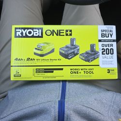 Ryobi Charger And 2 Batteries