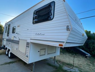 5TH WHEEL TRAVEL TRAILER WITH POWER SLIDE OUT 23-FOOT LONG