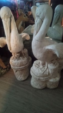2 cement pelicans for in or outside