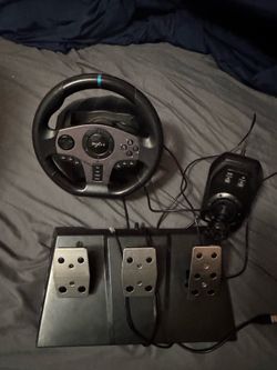 Steering wheel, pedal and gear shifter