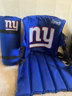 NY Giants stadium seats with backpack
