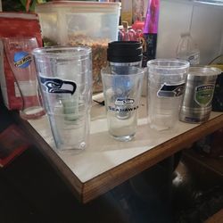 11 Seahawk Glases 3 Seahawk shot glasses.2 old Coke glasses one Killer .Batman Coffe Mug And one blue moon cook