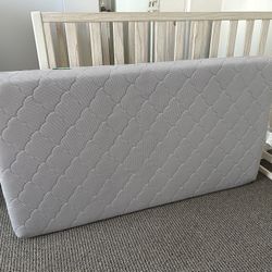 Newton Baby Waterproof Crib Mattress and Extra Pad