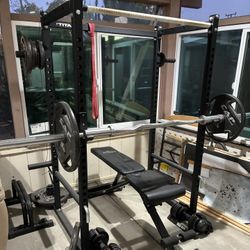 Power Rack With Barbell, Curling Bar, And Weights