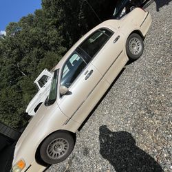 2001 Lincoln Town Car• Cartier L Sedan 4D