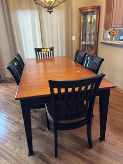 Wood Dining Table with 6 Black Chairs