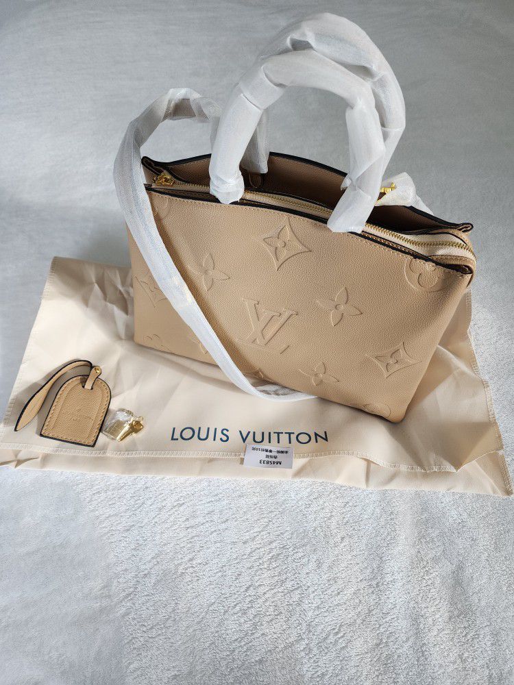 Louis Vuitton Lock And Key Tote Bags