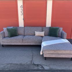 Gray Living Spaces Sectional w/ Reversible Chaise