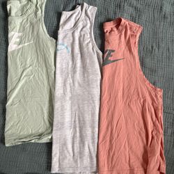 Set Of 3 Nike Tanks Tops (womens L/mens M)