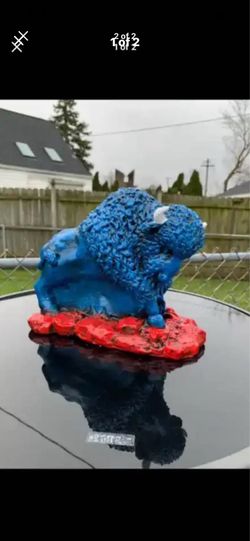 Red, white and blue buffalo statue