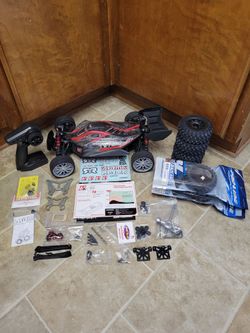Arrma typhon 6s v5 1/8 Scale 4wd Buggy. Only Run 3 Times On Street. $500.00 in upgrade parts. Like New