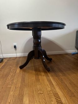Dining table - solid dark wood