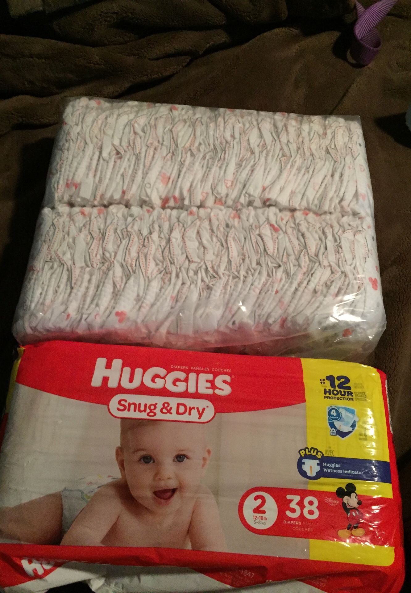 Huggies newborn diapers and size 2