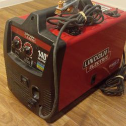Lincoln welder.
 140  H D,Stick and feed.