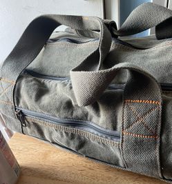 Green canvas travel bag