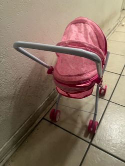 Carreola para muñeca pequeña