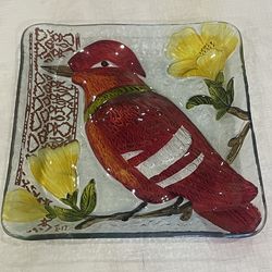 Hand-painted glass plate by F. de Villeneuve featuring a bird and floral motif. 8.25”x 8.25”