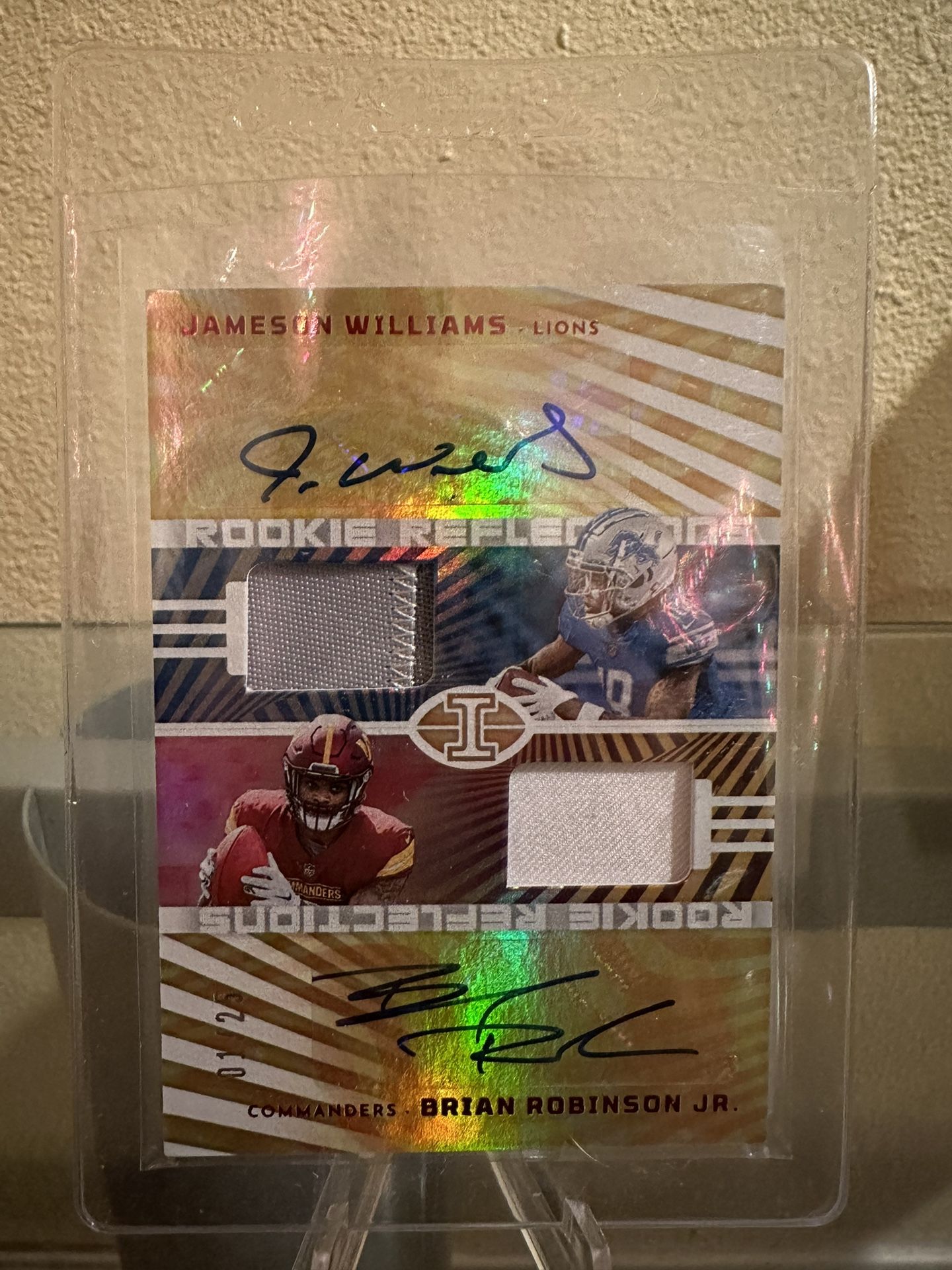 NFL football Card Jameson Williams And Brian Robinson Jr Dual Patch auto Rookie Illusions