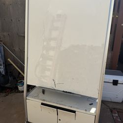 Free white board with small cabinets