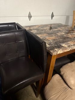 Dinning table with 4 leather chairs