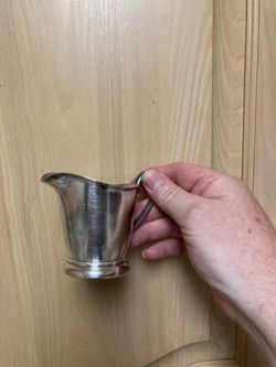 Victor silver creamers
