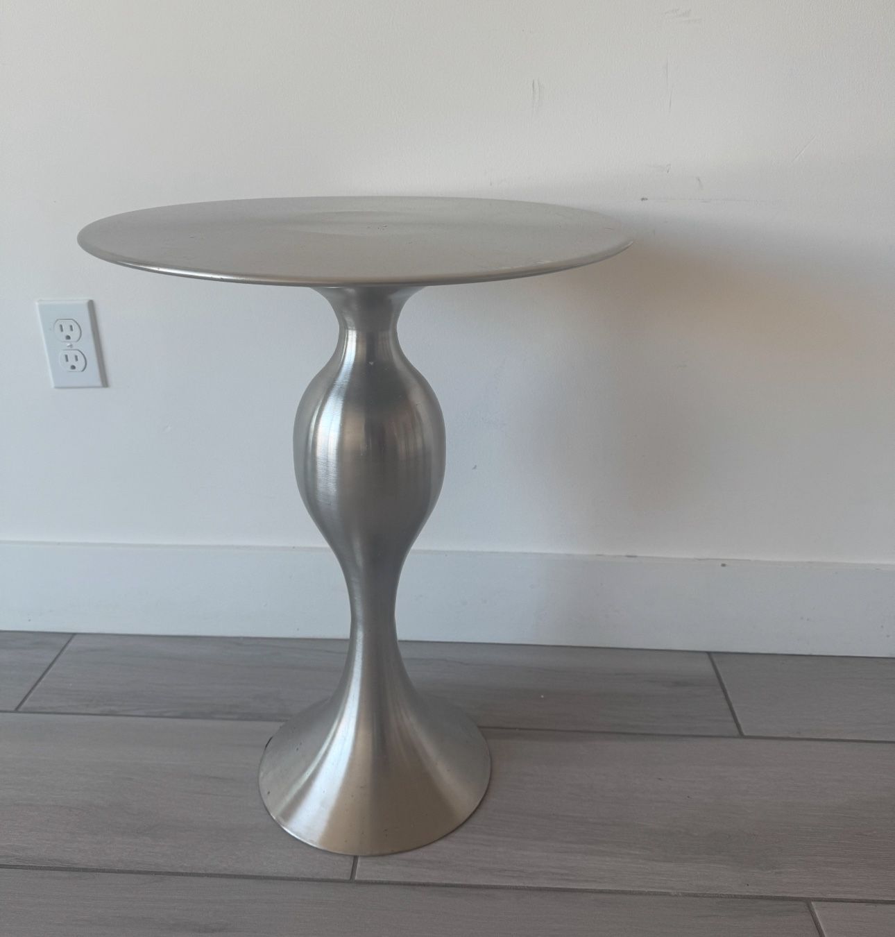 2 Round Silver Tables