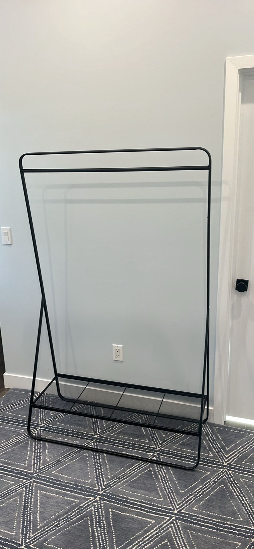 Freestanding clothing, garment rack, black metal