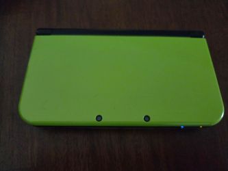 New Nintendo 3DS XL/LL  LOTS of games w/ Charger & Case